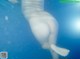 A woman's butt is submerged in the water. 